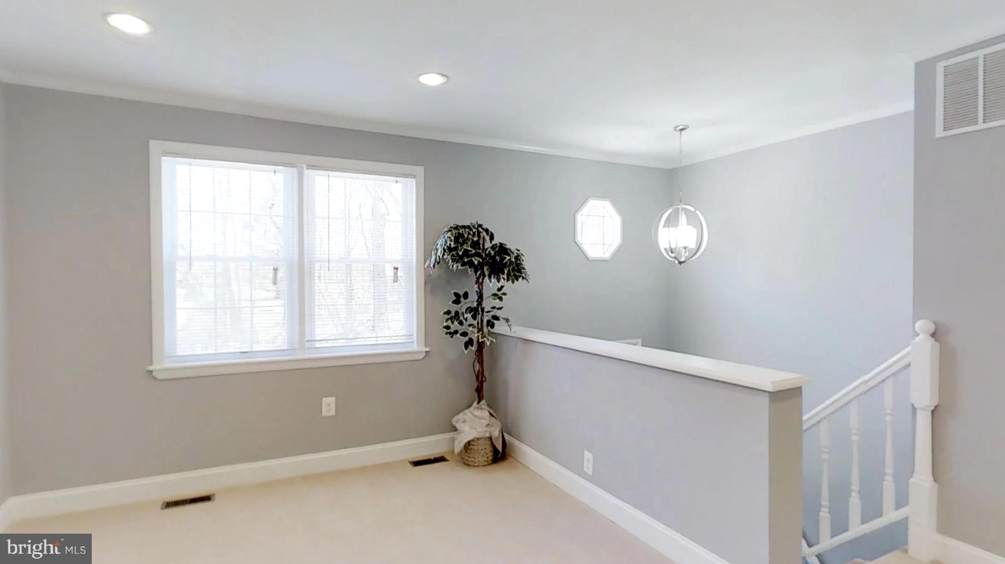 7764 Telegraph Road Severn, MD 21144 - Photo 15 of 24 a view of a livingroom with a window