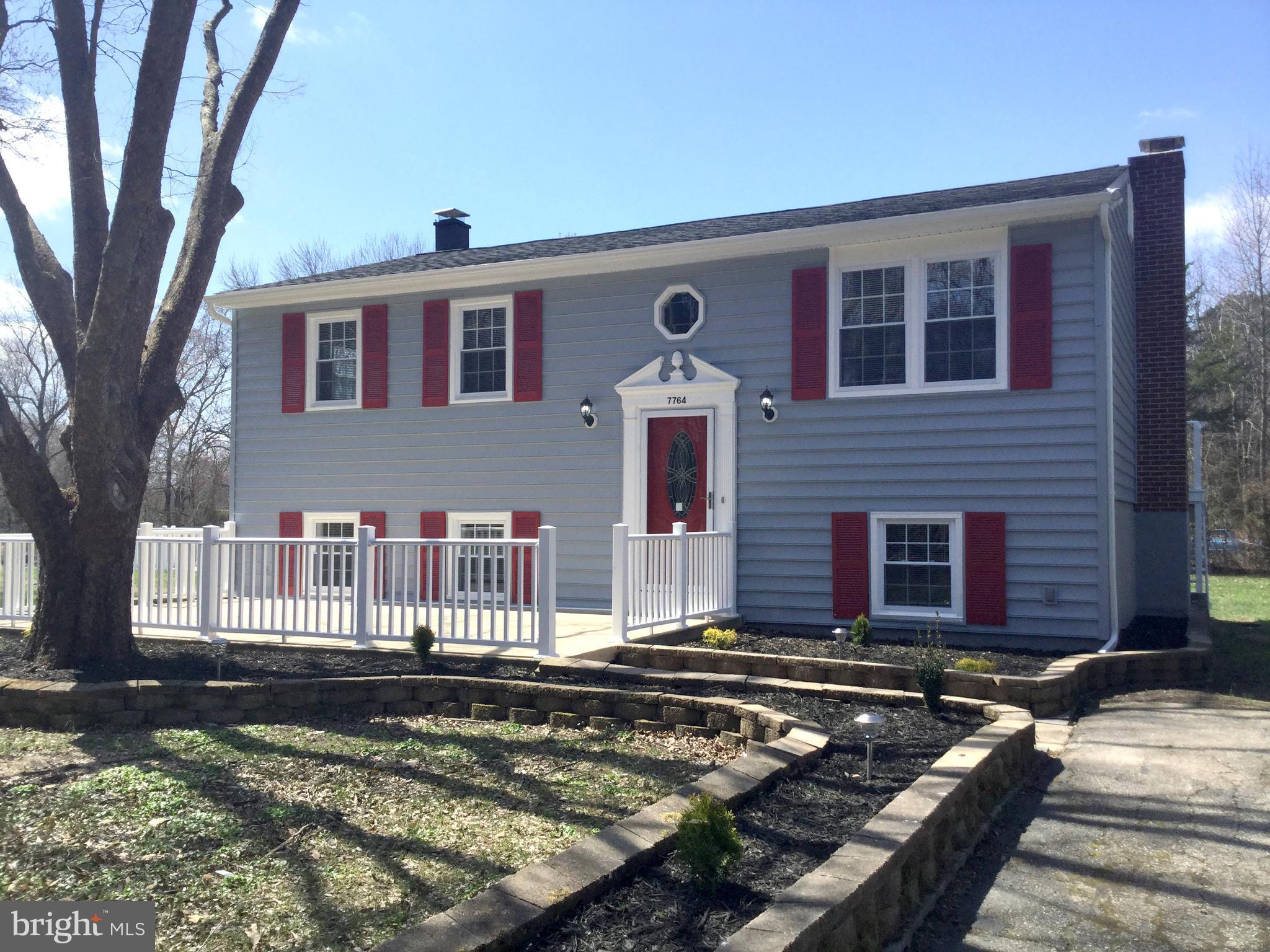 7764 Telegraph Road Severn, MD 21144 - Photo 22 of 24 a front view of house with yard
