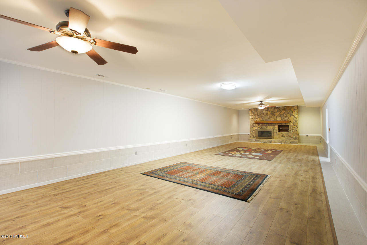 2613 Middle Sound Loop Road Wilmington, NC 28411 - Photo 38 of 53 BasementRoom#1 with Fireplace_2613 Middl