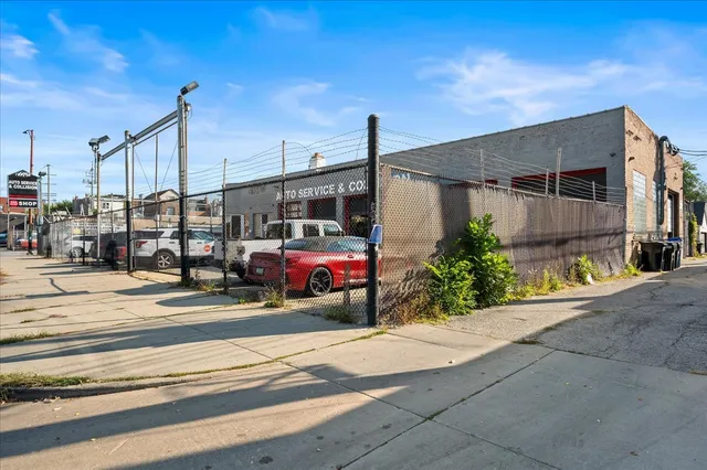 a view of a house with a street