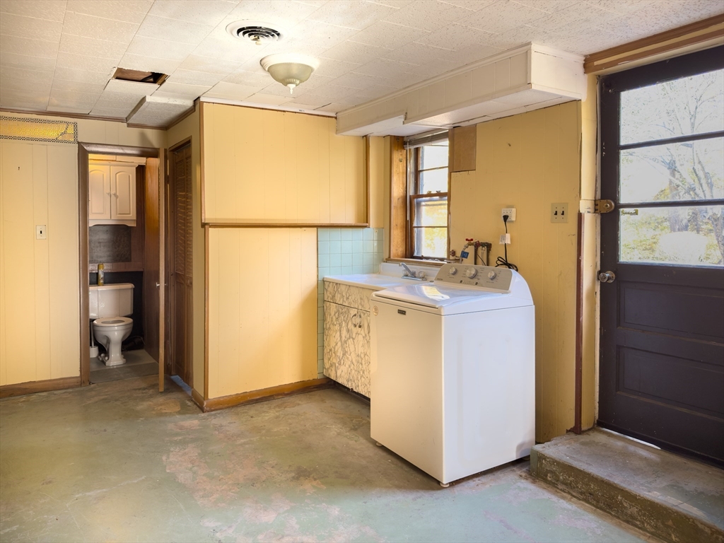 84 Bethany Road Framingham, MA 01702 - Photo 29 of 38 a utility room with closet washer and dryer