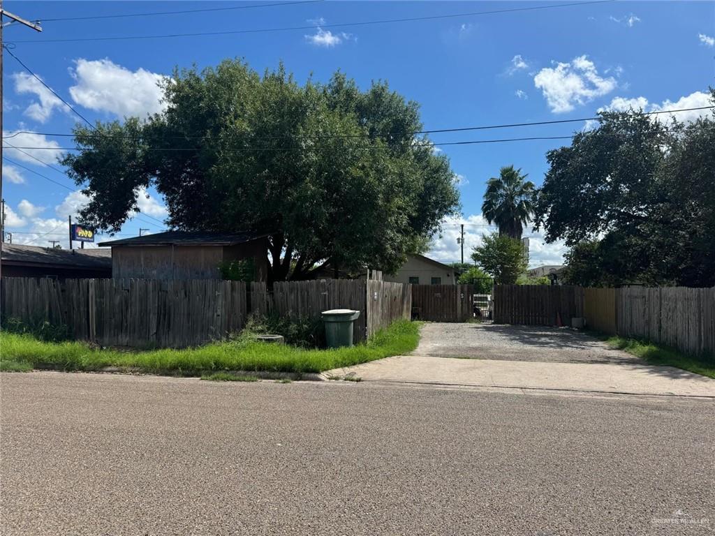1620 North Raul Longoria Road San Juan, TX 78589 - Photo 2 of 2 a view of flower garden with wooden fence