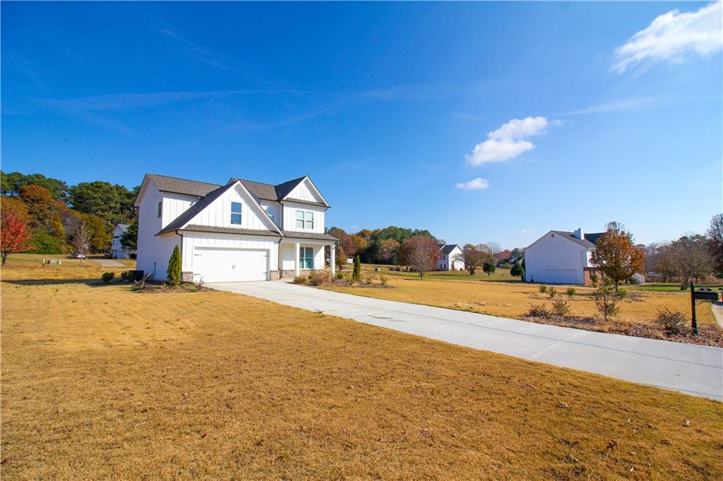 96 Boogies Run Commerce, GA 30529 - Photo 26 of 28 a view of large house with a big yard
