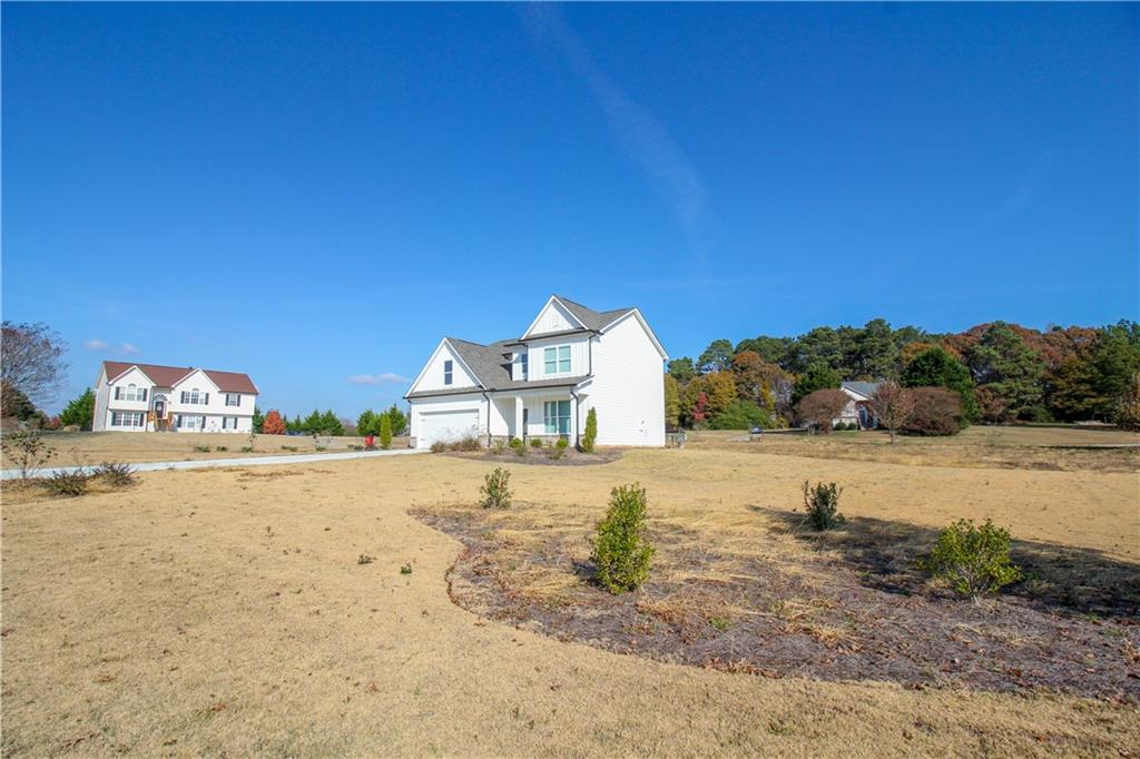 96 Boogies Run Commerce, GA 30529 - Photo 4 of 28 a view of a large body of water with a building in the background