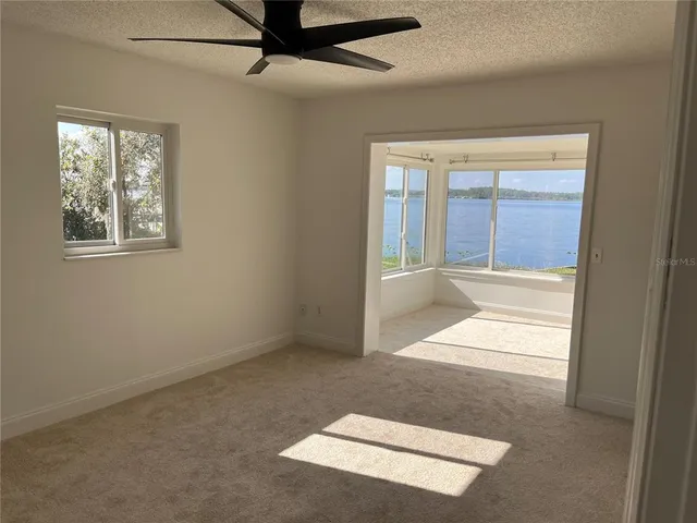 a view of a room with a large window