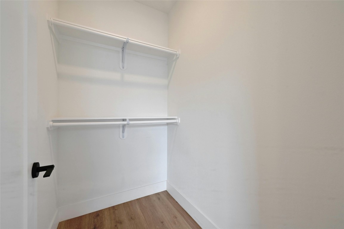 1701 Simond Avenue, Unit 328 Austin, TX 78723 - Photo 17 of 35 a view of a room with wooden floor