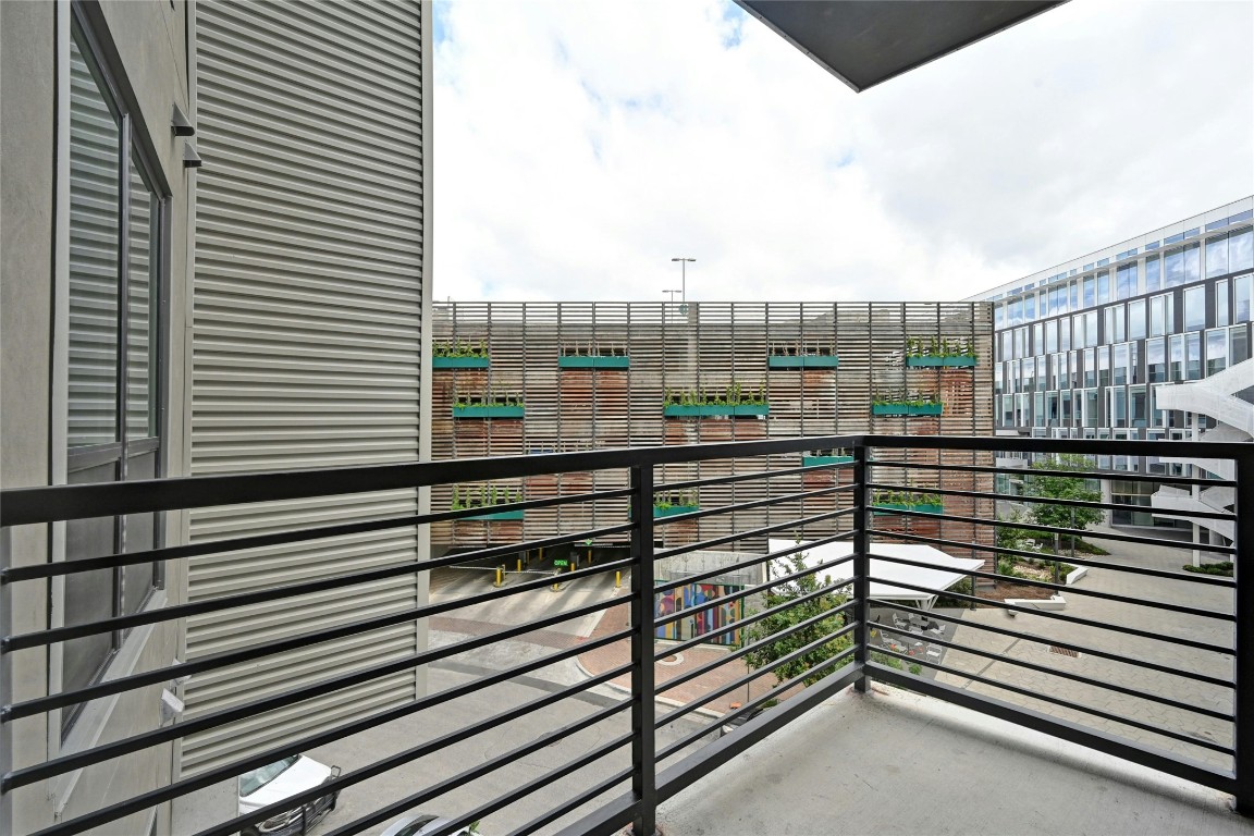 1701 Simond Avenue, Unit 328 Austin, TX 78723 - Photo 22 of 35 a view of a balcony with a floor to ceiling window