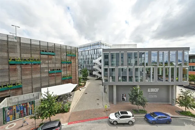 a city street lined with tall buildings
