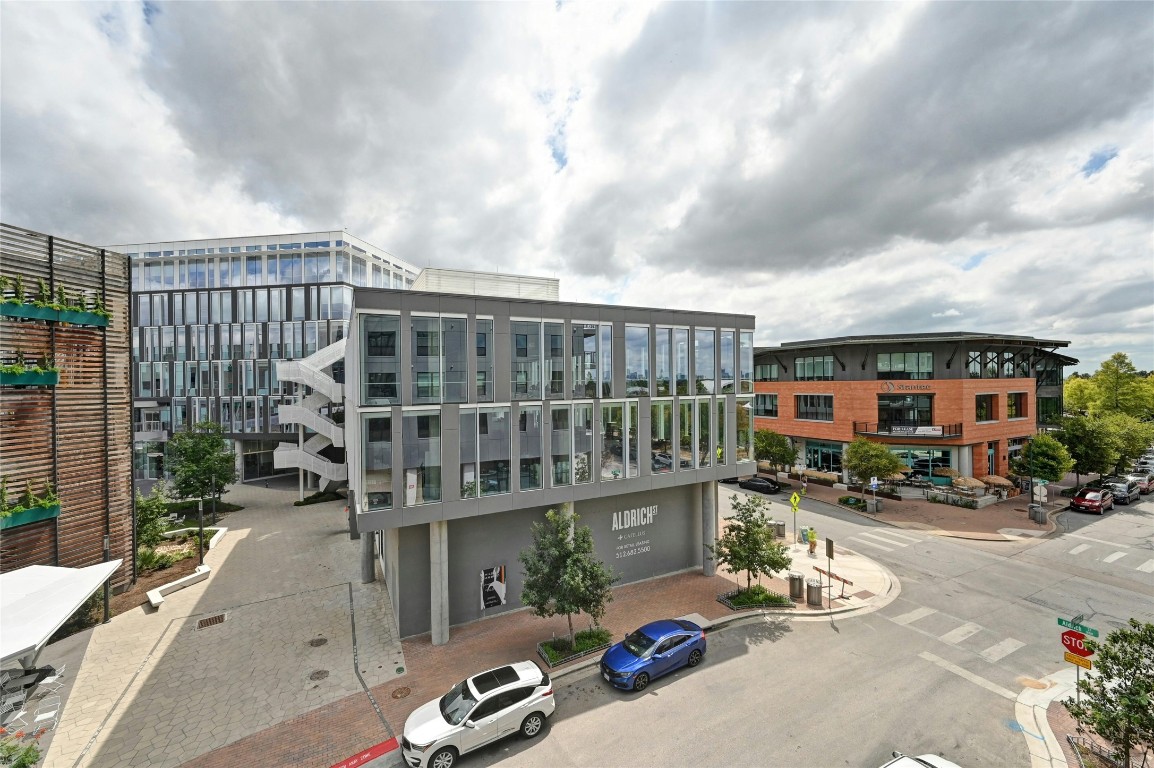 1701 Simond Avenue, Unit 328 Austin, TX 78723 - Photo 26 of 35 a city street lined with tall buildings