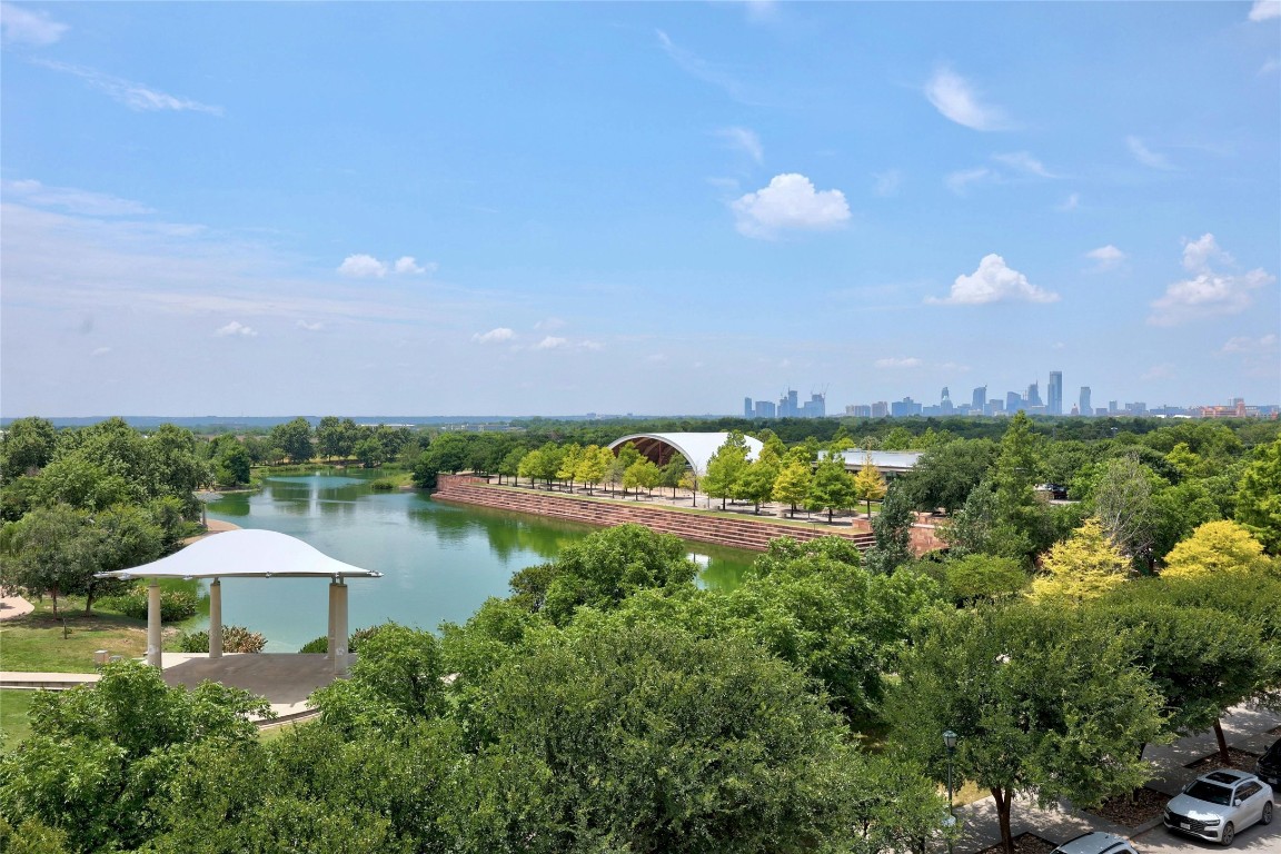 1701 Simond Avenue, Unit 328 Austin, TX 78723 - Photo 34 of 35 a view of a lake with houses in the back