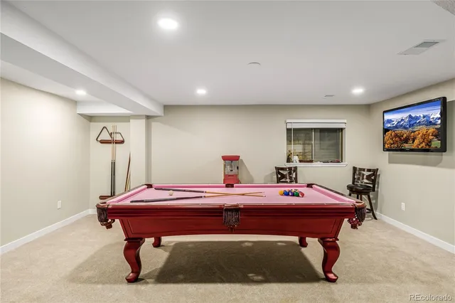 a room with a table and chairs