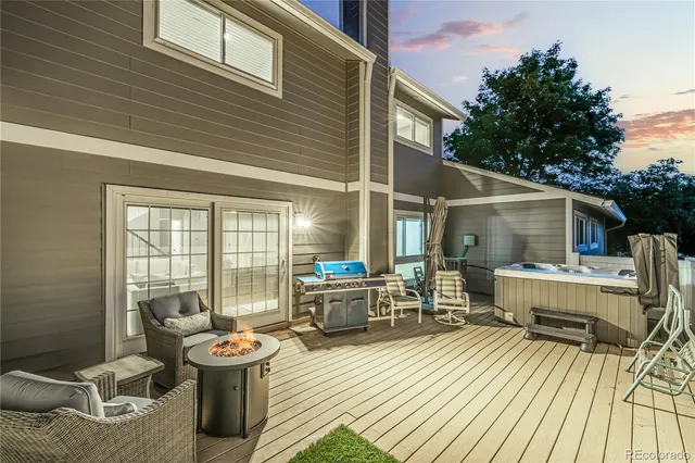 a view of balcony with furniture