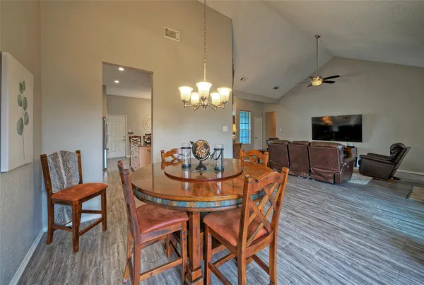 a kitchen with stainless steel appliances granite countertop a stove and a sink