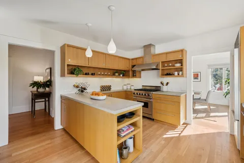 a view of a workspace with furniture