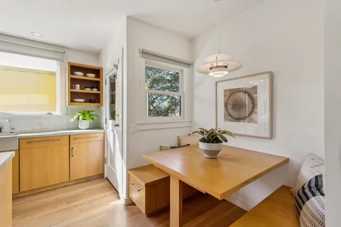 a view of cabinets and wooden floor