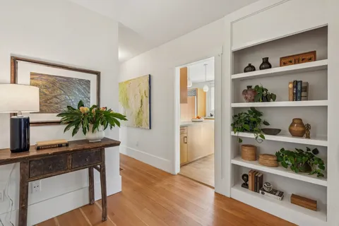 a bedroom with a large bed and a couch