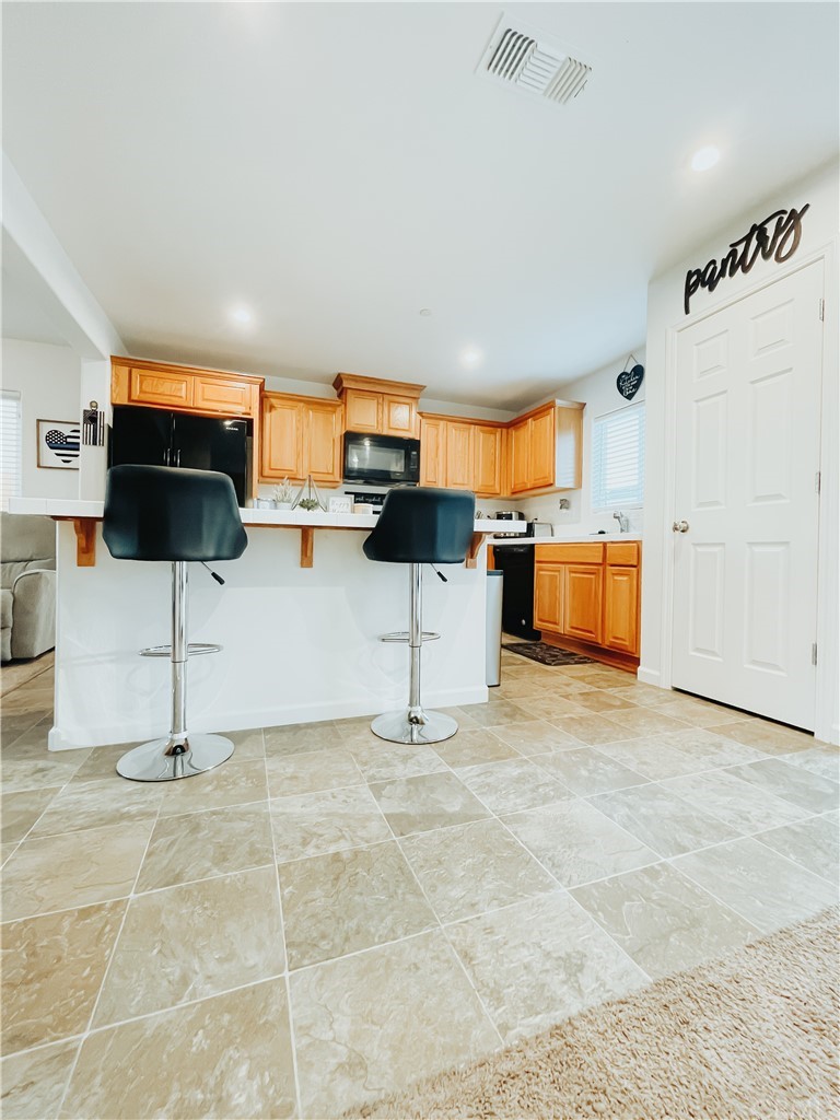 385 Ostrander Avenue Merced, CA 95341 - Photo 2 of 12 a view of a room with gym equipment