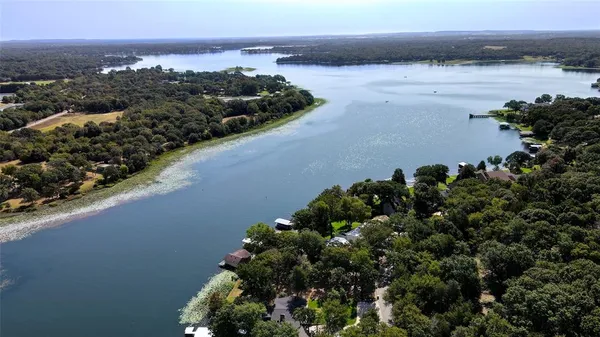 a view of a lake with a city