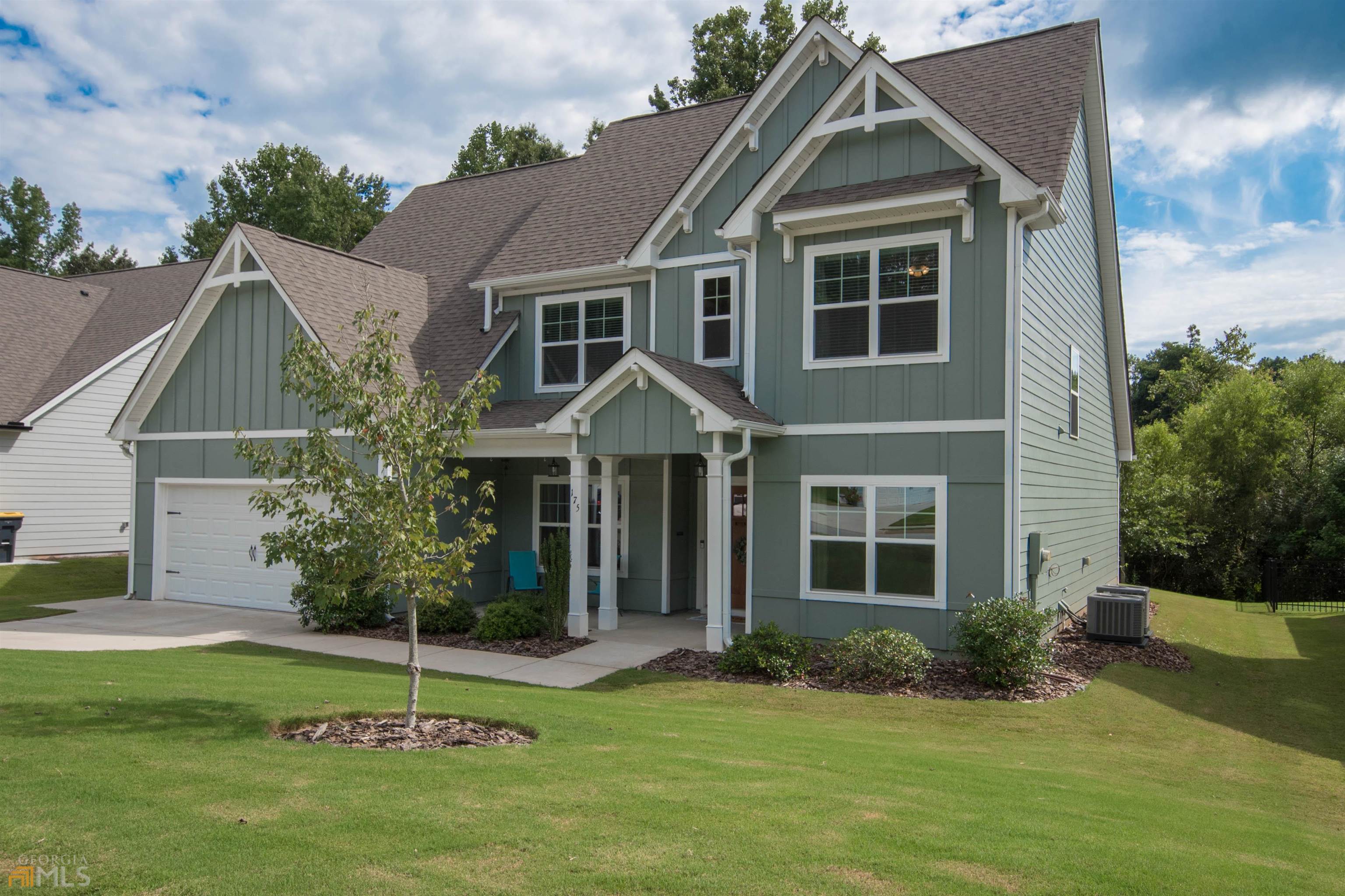 175 S Ridge Senoia, GA 30276 - Photo 1 of 1 a front view of a house with a yard