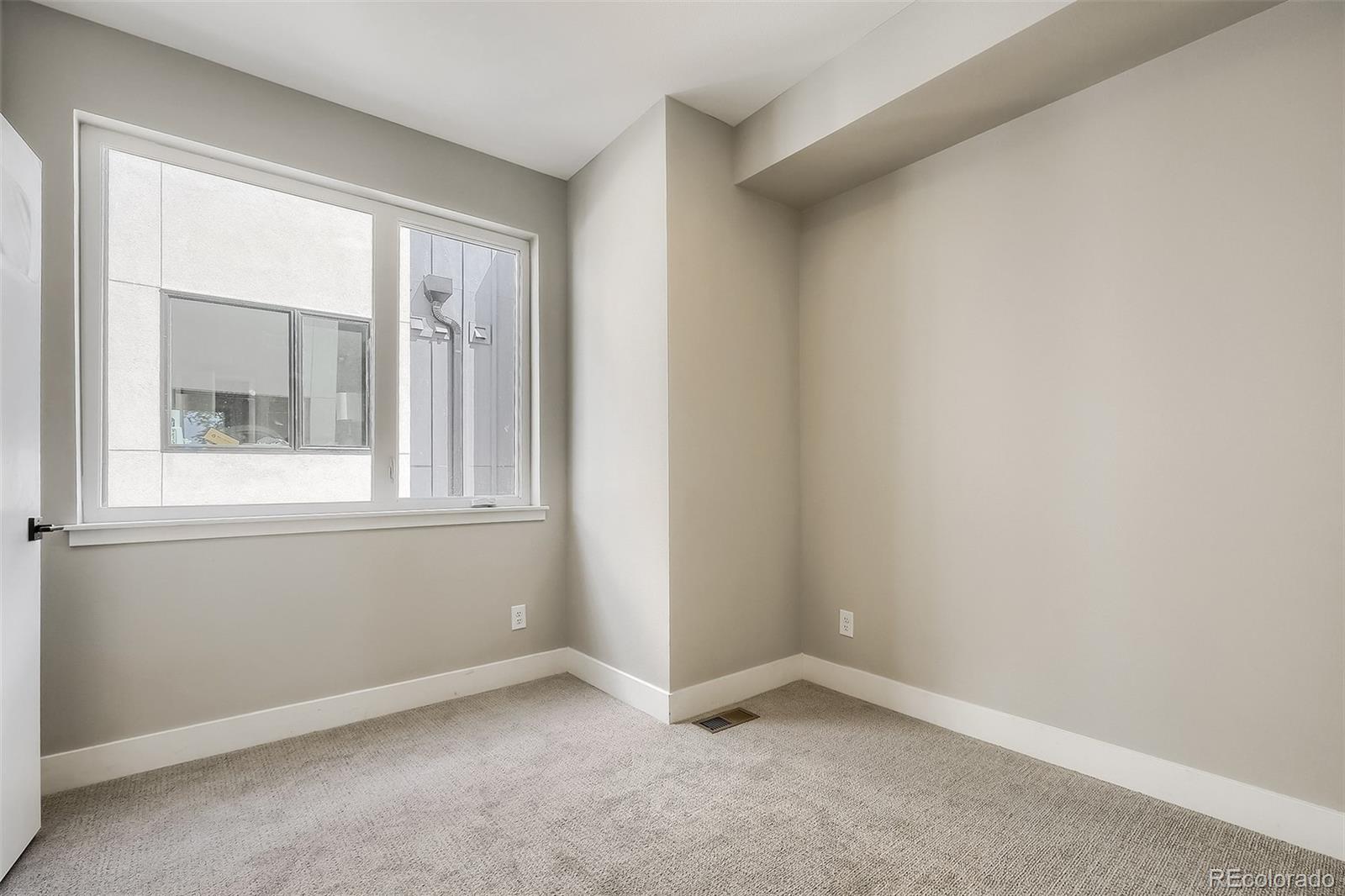 3820 Jason Street, Unit 6 Denver, CO 80211 - Photo 18 of 31 an empty room with a window