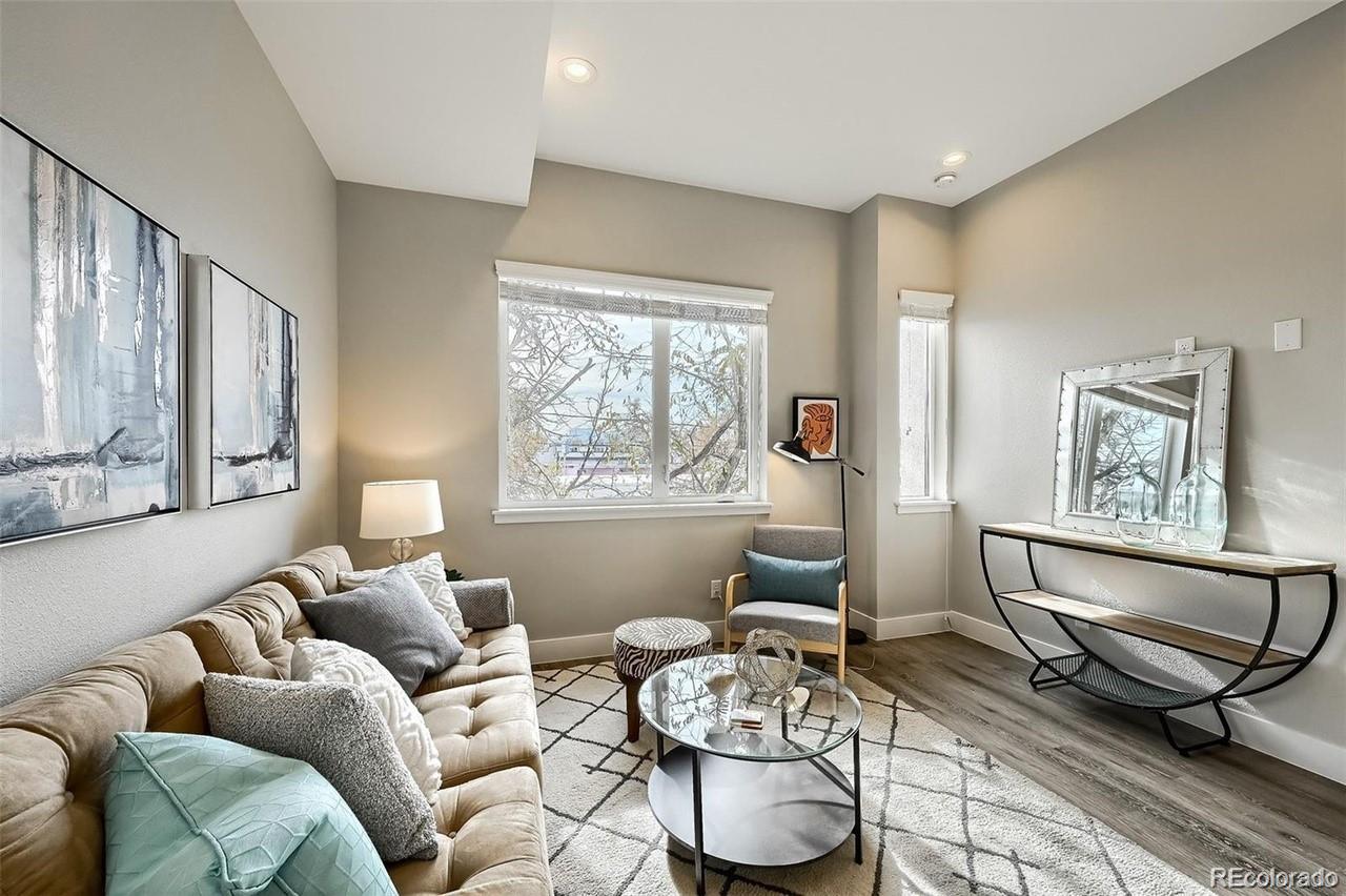 3820 Jason Street, Unit 6 Denver, CO 80211 - Photo 7 of 31 a living room with furniture and wooden floor