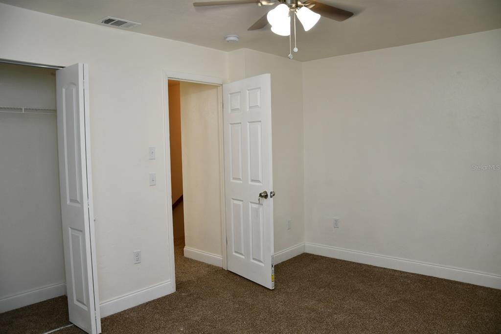 2635 Southwest 35th Place, Unit 1302 Gainesville, FL 32608 - Photo 16 of 17 an empty room with a bathroom