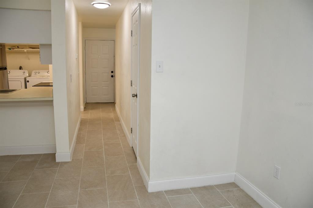 2635 Southwest 35th Place, Unit 1302 Gainesville, FL 32608 - Photo 2 of 17 a view of a bathroom from the hallway