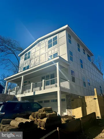 a front view of a house with a balcony