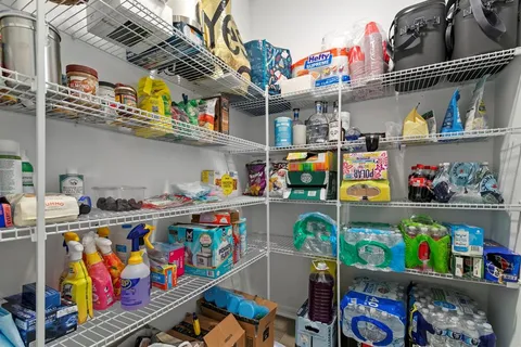 a store room with lots of fruit and vegetables