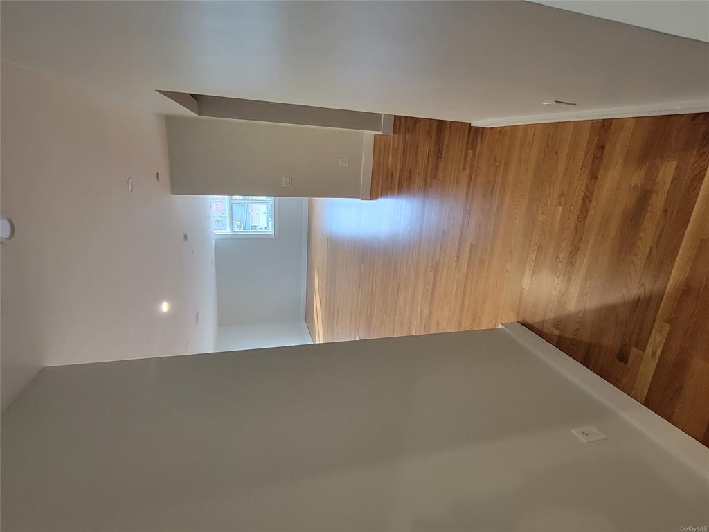 731 Broadway, Unit 4 Valhalla, NY 10595 - Photo 15 of 25 a view of hallway with wooden floor