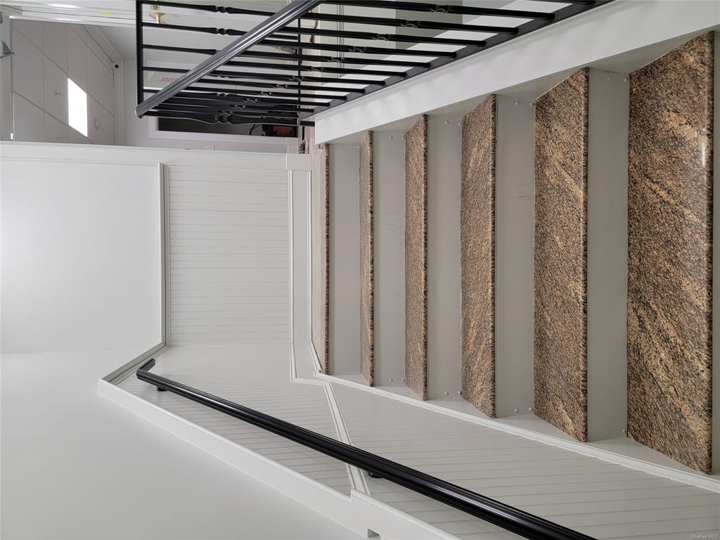 731 Broadway, Unit 4 Valhalla, NY 10595 - Photo 25 of 25 a view of staircase with white walls