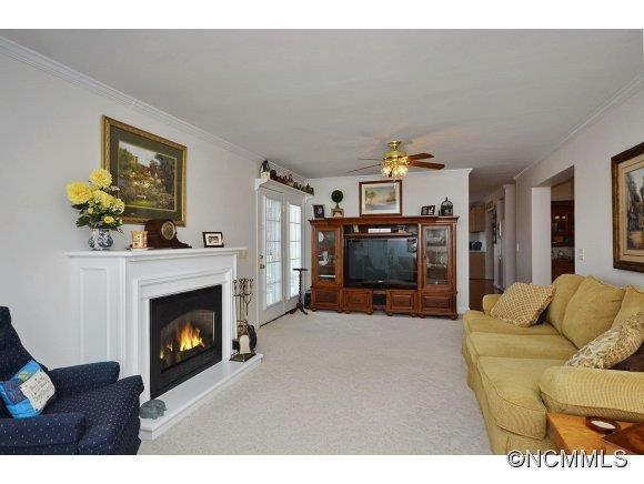 30 Splendor Ridge Waynesville, NC 28785 - Photo 11 of 23 a living room with furniture and a fireplace