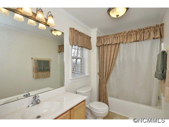 30 Splendor Ridge Waynesville, NC 28785 - Photo 15 of 23 a bathroom with a sink a mirror and a shower