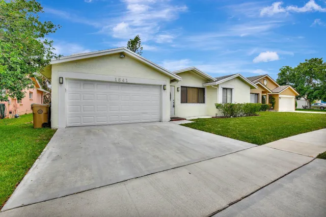 a view of outdoor space yard and garage