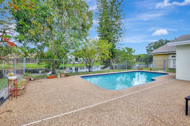 a view of a yard with a patio