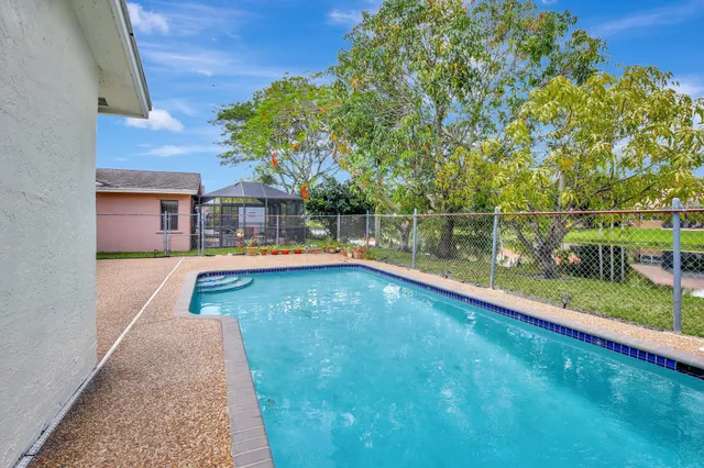 a view of a lake with a tree