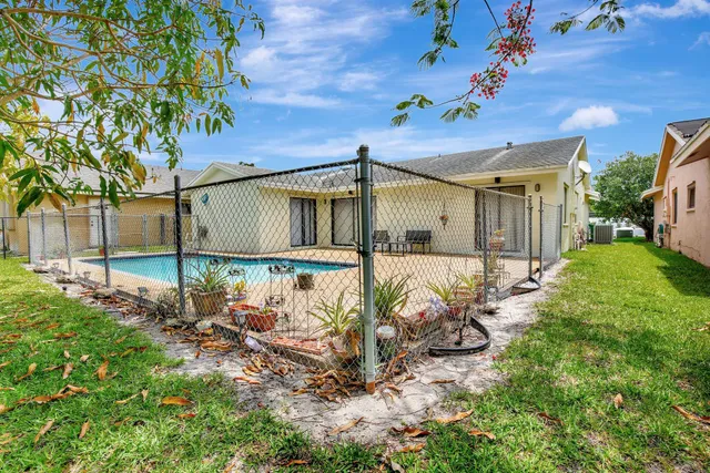 a view of a barn with a yard