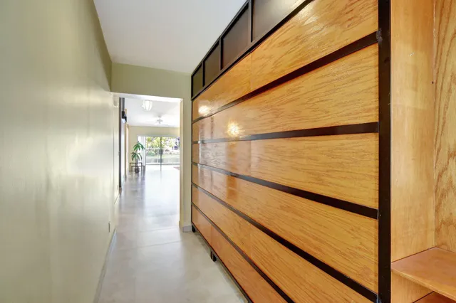 a view of balcony with floor to ceiling window with wooden floor
