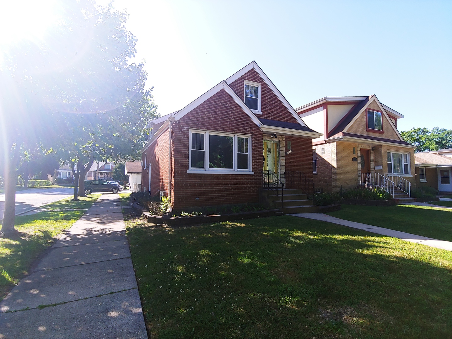 2831 Indian Boundary Road River Grove, IL 60171 - Photo 2 of 19 a front view of a house with a garden