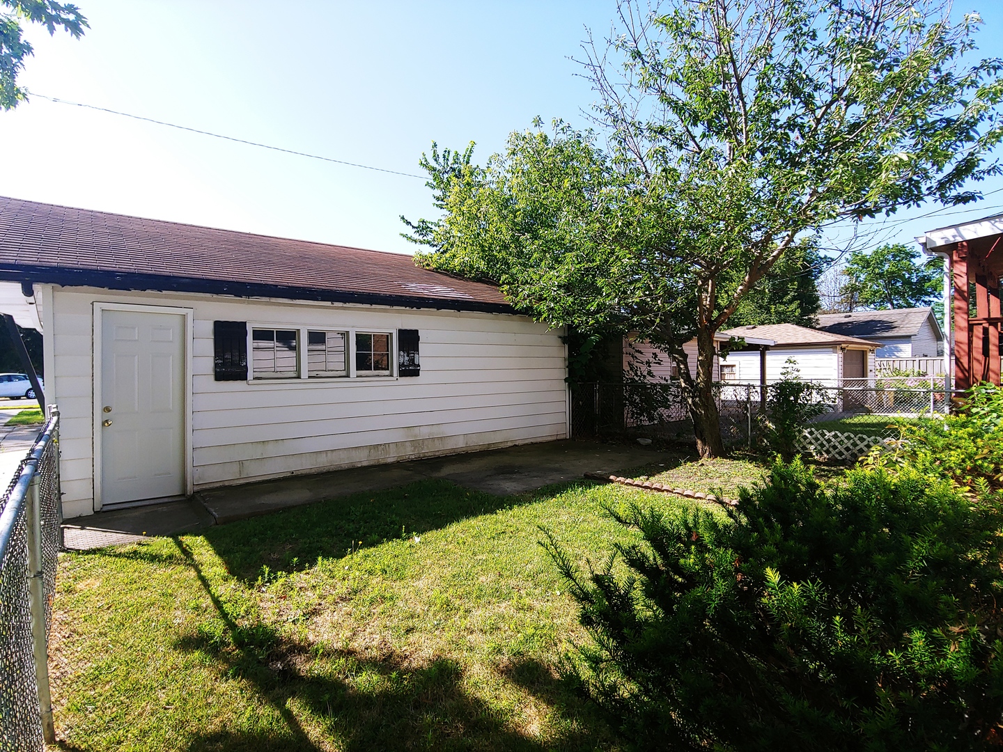 2831 Indian Boundary Road River Grove, IL 60171 - Photo 18 of 19 a view of a backyard with plants and large tree