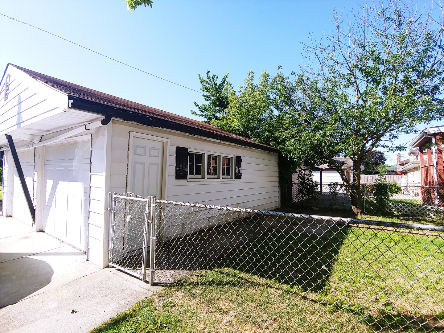 2831 Indian Boundary Road River Grove, IL 60171 - Photo 19 of 19 a front view of a house with a yard