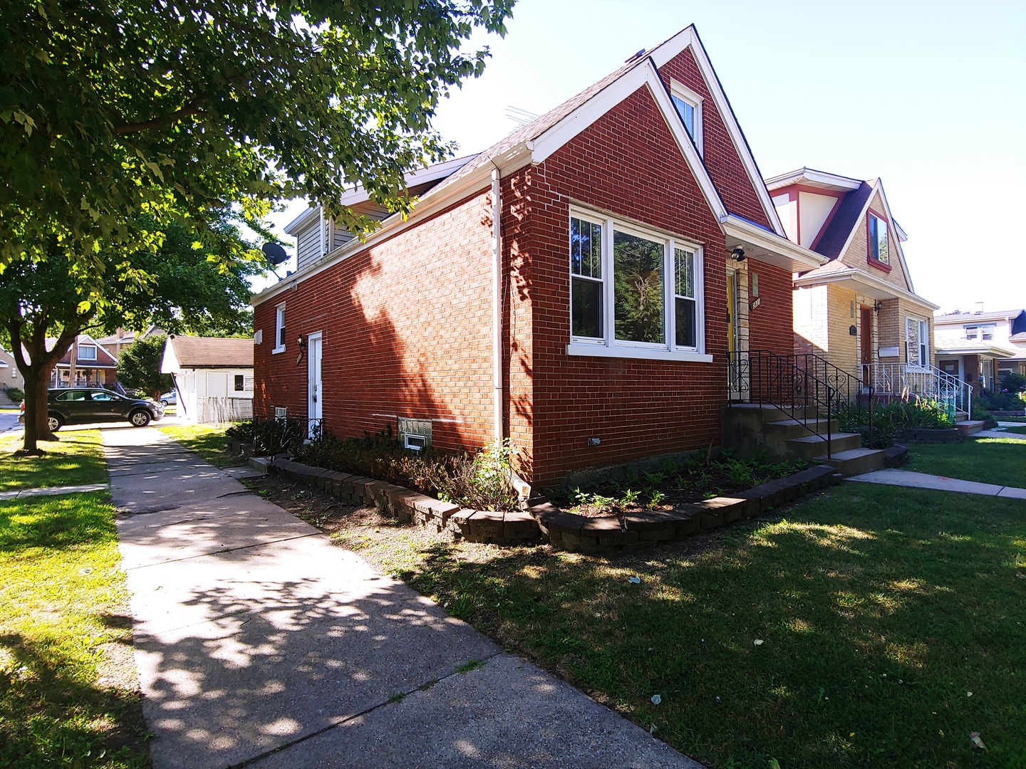 2831 Indian Boundary Road River Grove, IL 60171 - Photo 3 of 19 a front view of a house with a yard