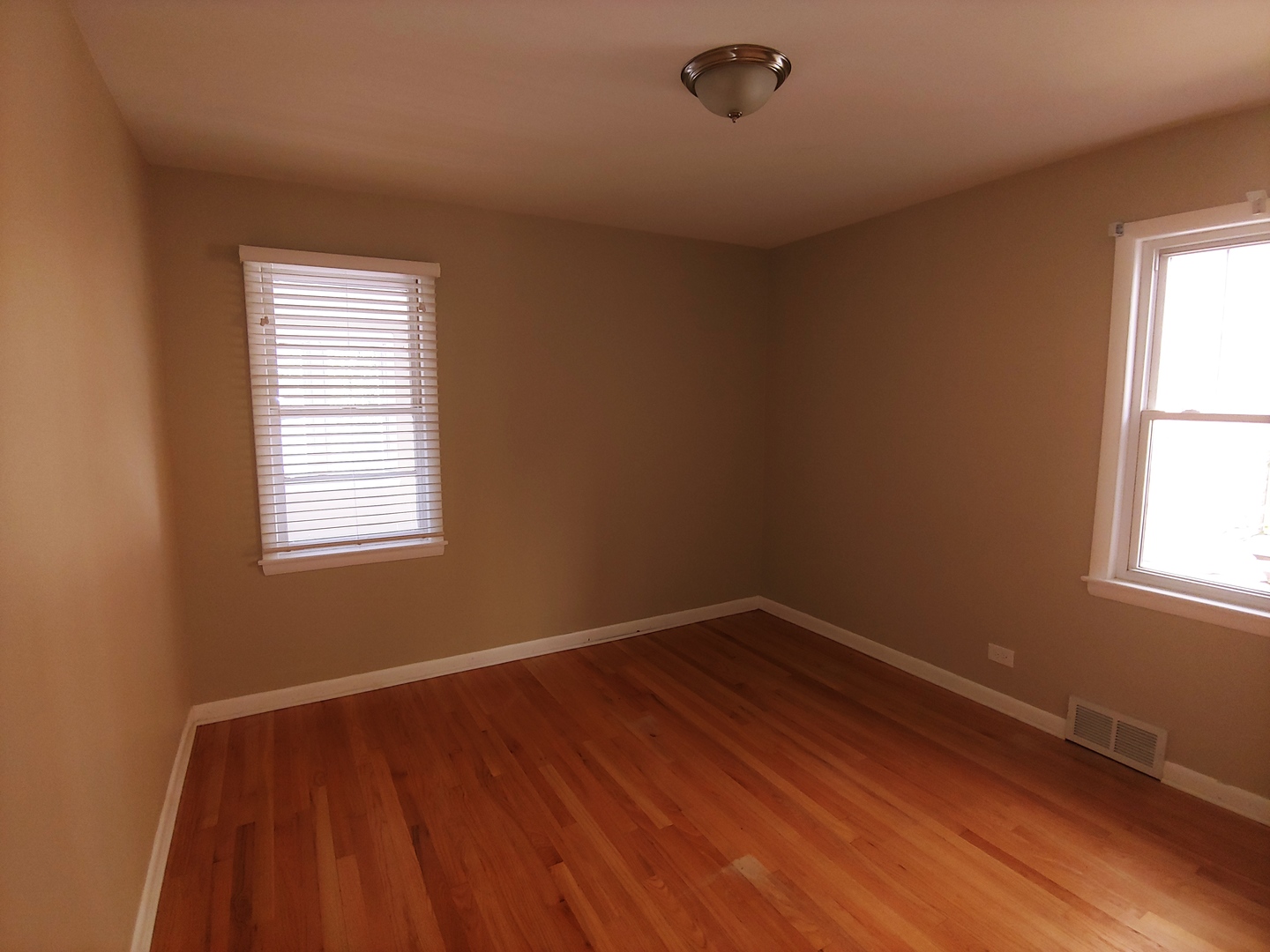 2831 Indian Boundary Road River Grove, IL 60171 - Photo 8 of 19 a view of a room with wooden floor and windows