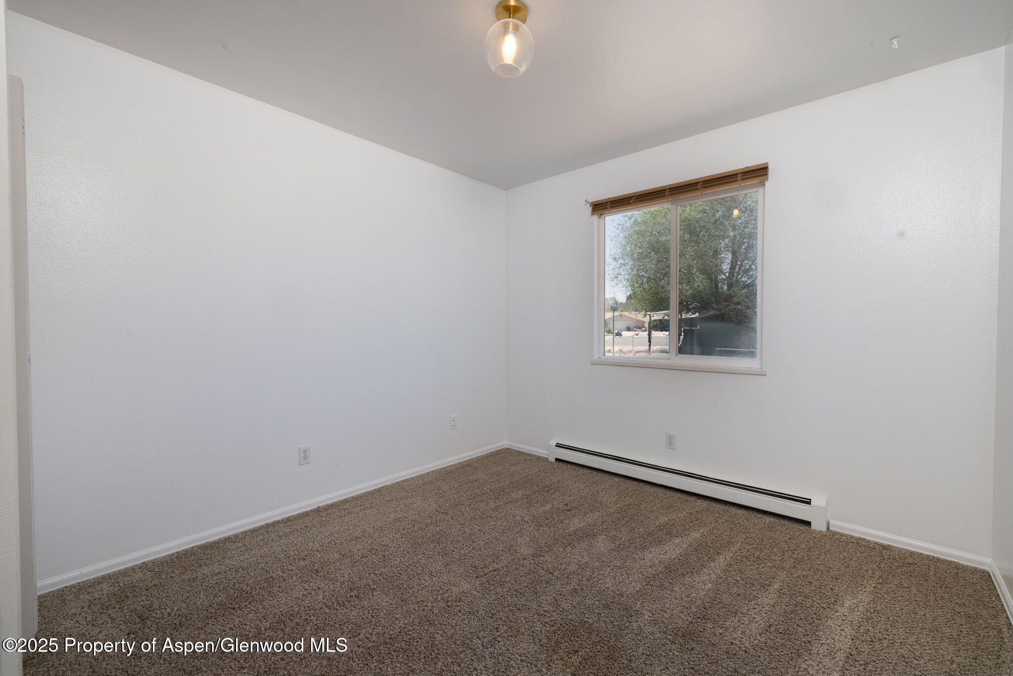 482 Fox Run Clifton, CO 81520 - Photo 12 of 25 an empty room with a window