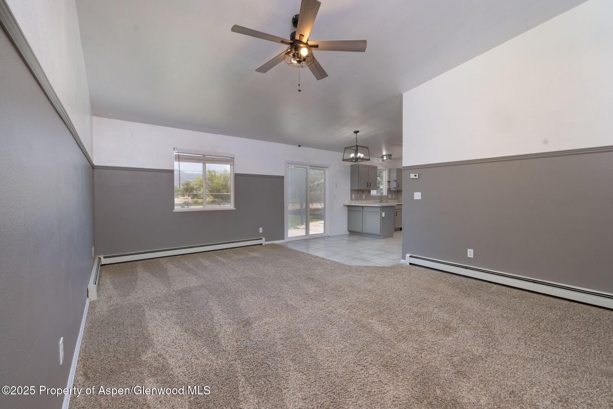 482 Fox Run Clifton, CO 81520 - Photo 14 of 25 a view of empty room with a kitchen