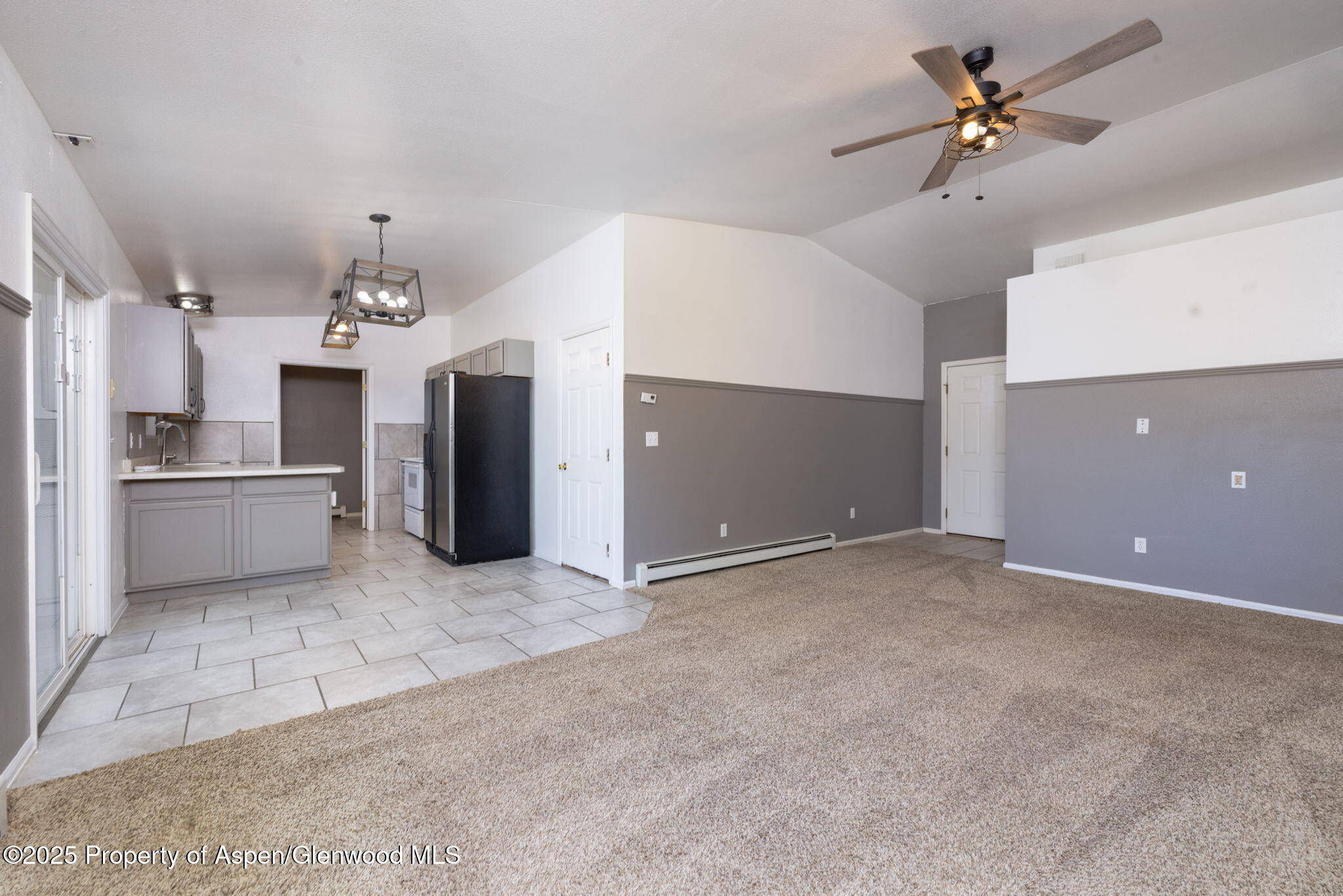 482 Fox Run Clifton, CO 81520 - Photo 16 of 25 a view of a kitchen with a sink and a ceiling fan