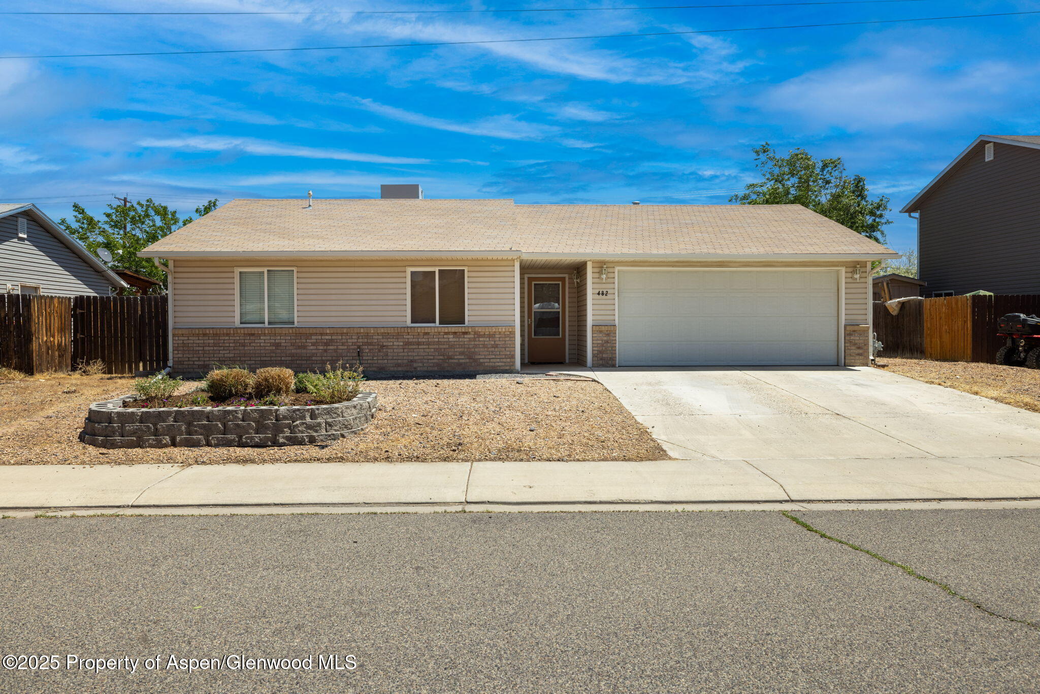 482 Fox Run Clifton, CO 81520 - Photo 2 of 25 a front view of a house with yard