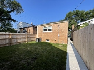 9042 South Lowe Avenue Chicago, IL 60620 - Photo 12 of 16 a view of front of house with a yard