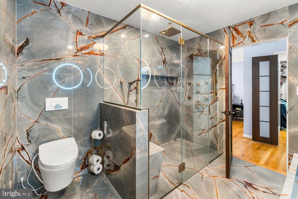 1329 Gresham Road Silver Spring, MD 20904 - Photo 23 of 56 a bathroom with a toilet and a shower