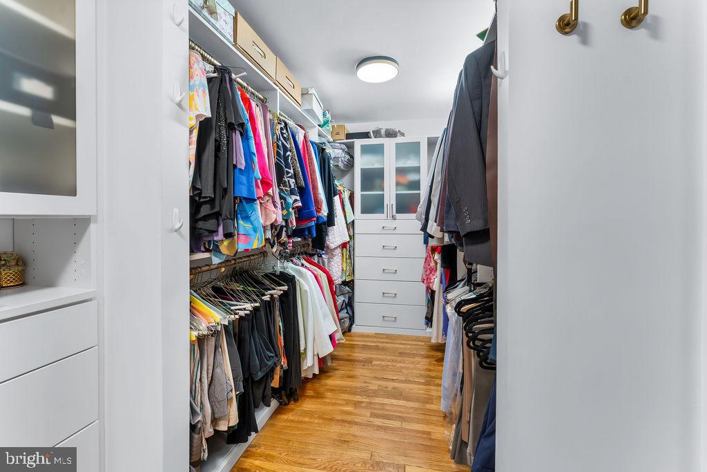 1329 Gresham Road Silver Spring, MD 20904 - Photo 26 of 56 a view of walk in closet with clothes and shoes